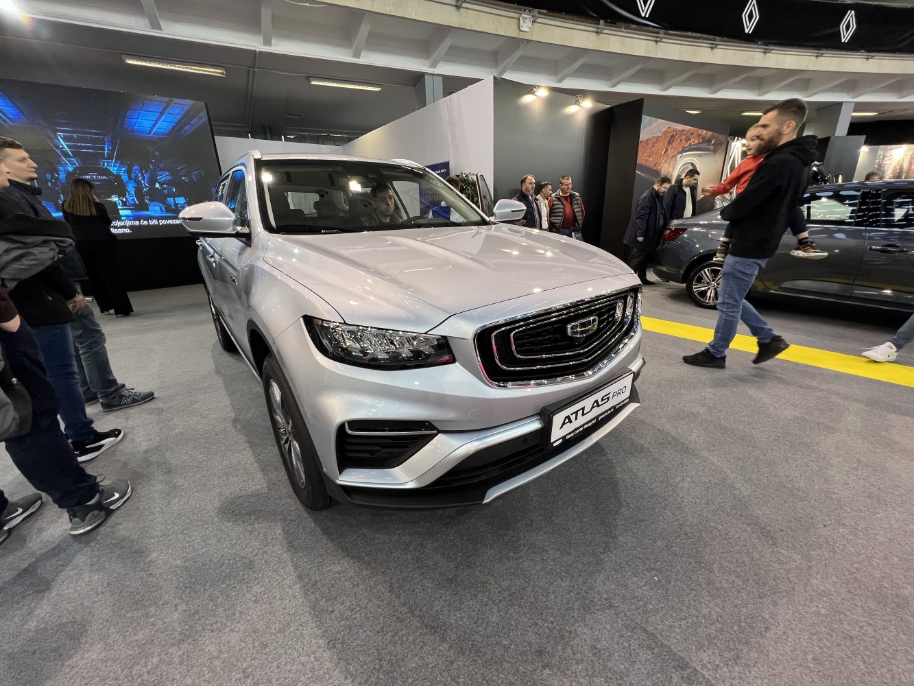 Front view of a modern SUV with distinctive grille and headlights