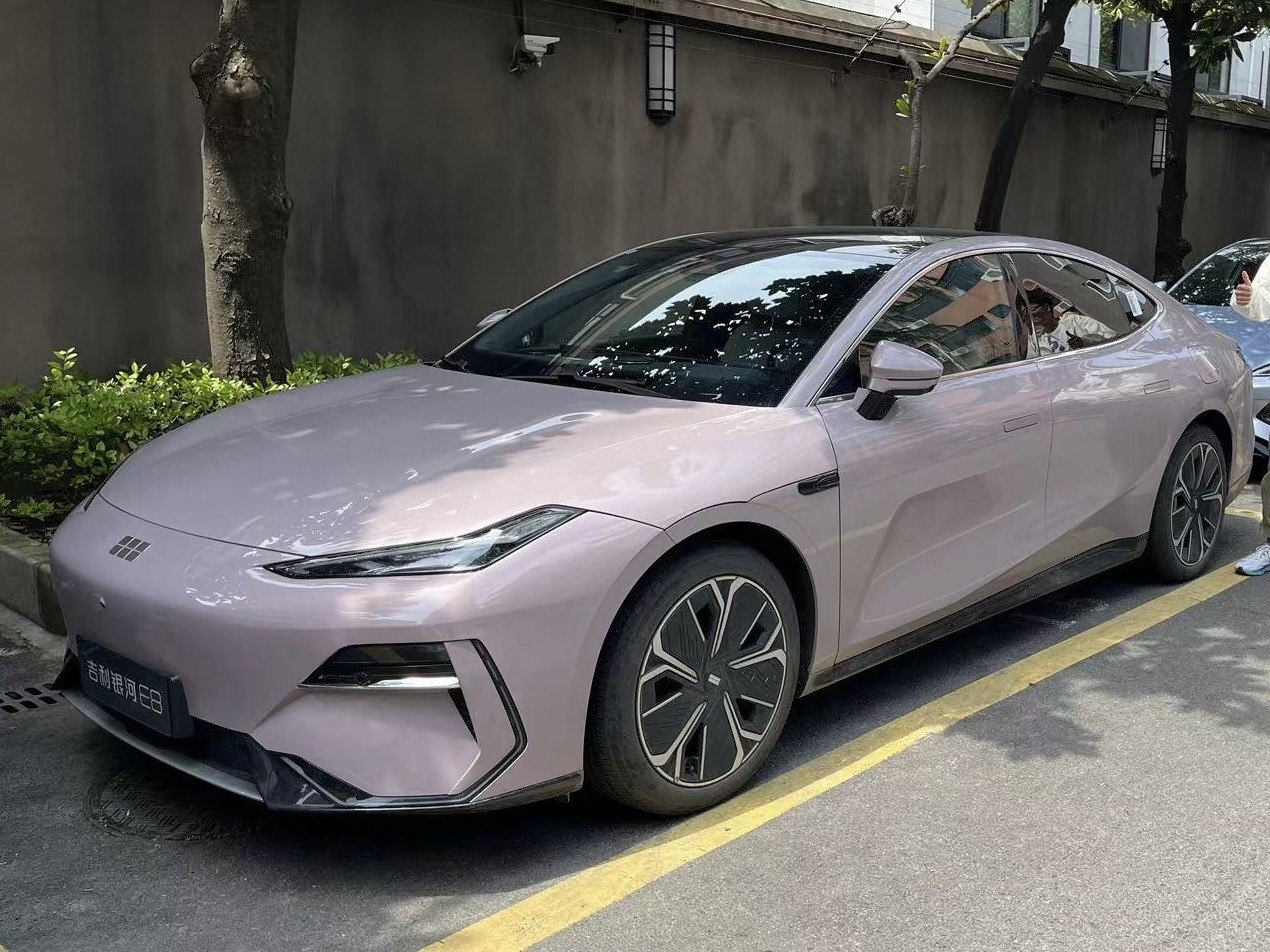 Sleek aerodynamic sedan front with LED headlights and modern design