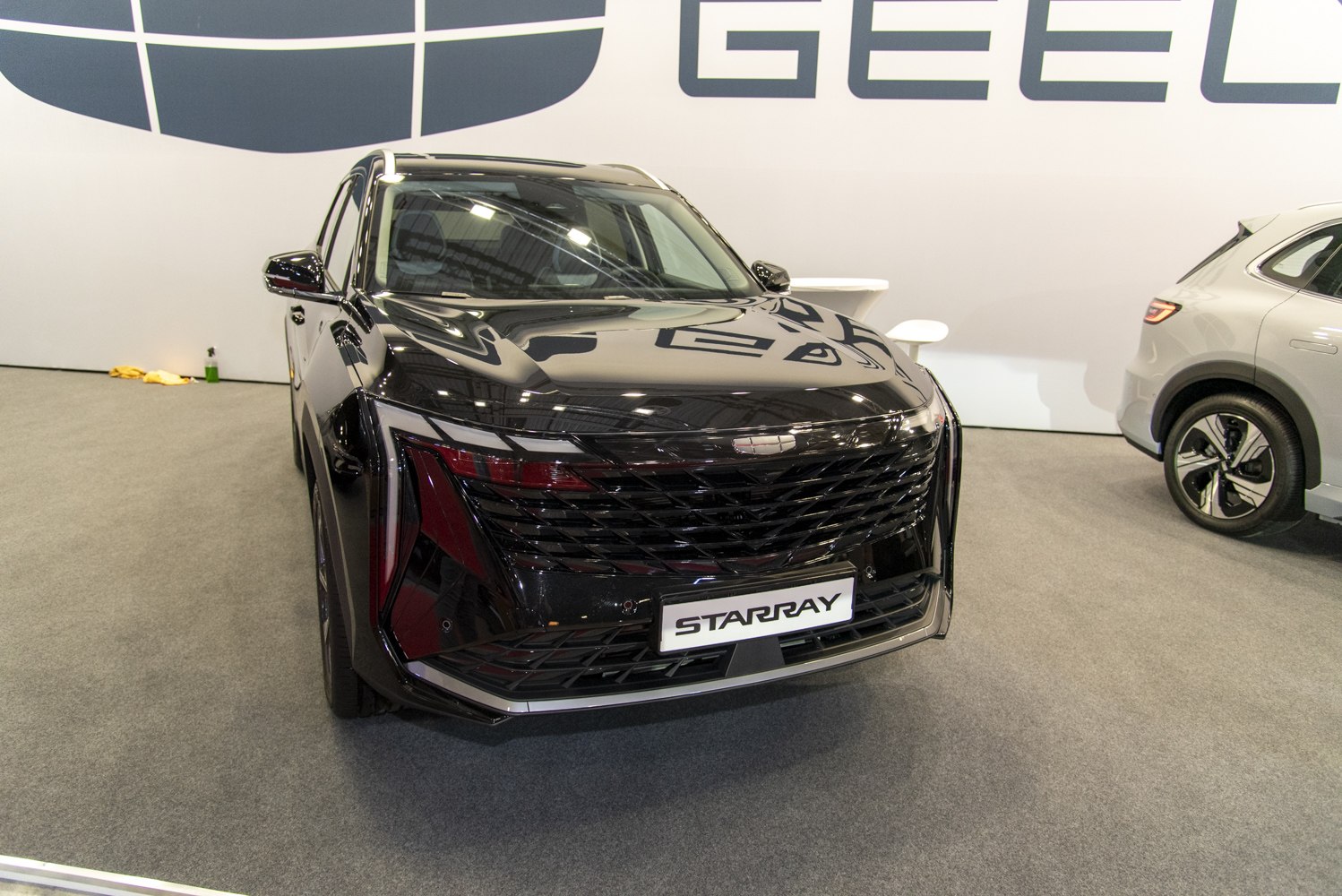 Front view of SUV with bold grille and sleek headlights
