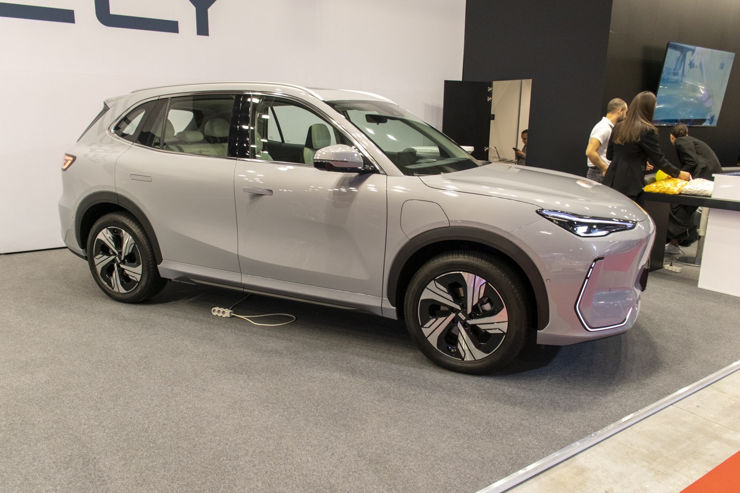 Modern electric SUV with sharp LED headlights and stylish alloy wheels