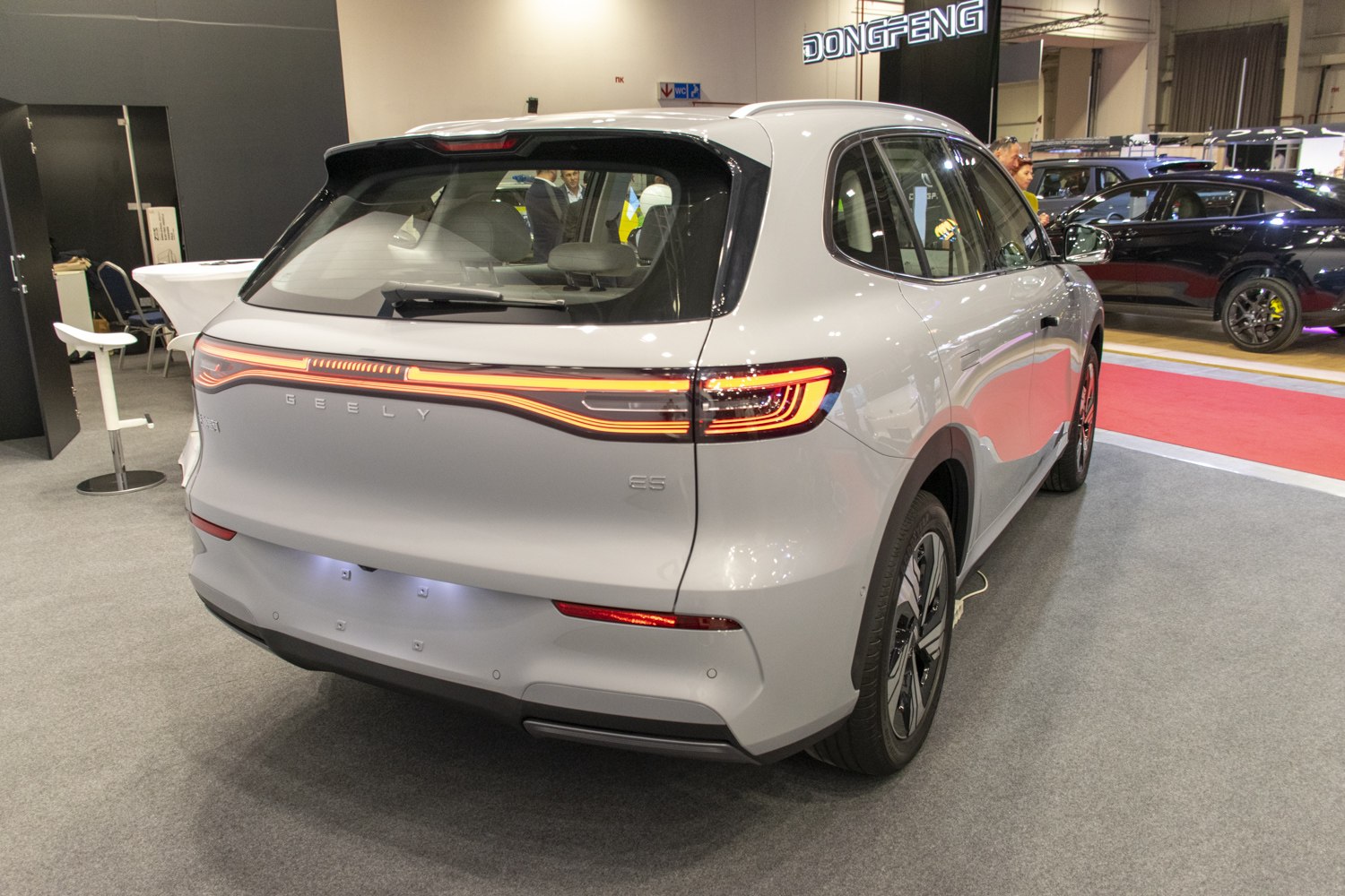 Sleek SUV rear with integrated LED tail lights and roof spoiler