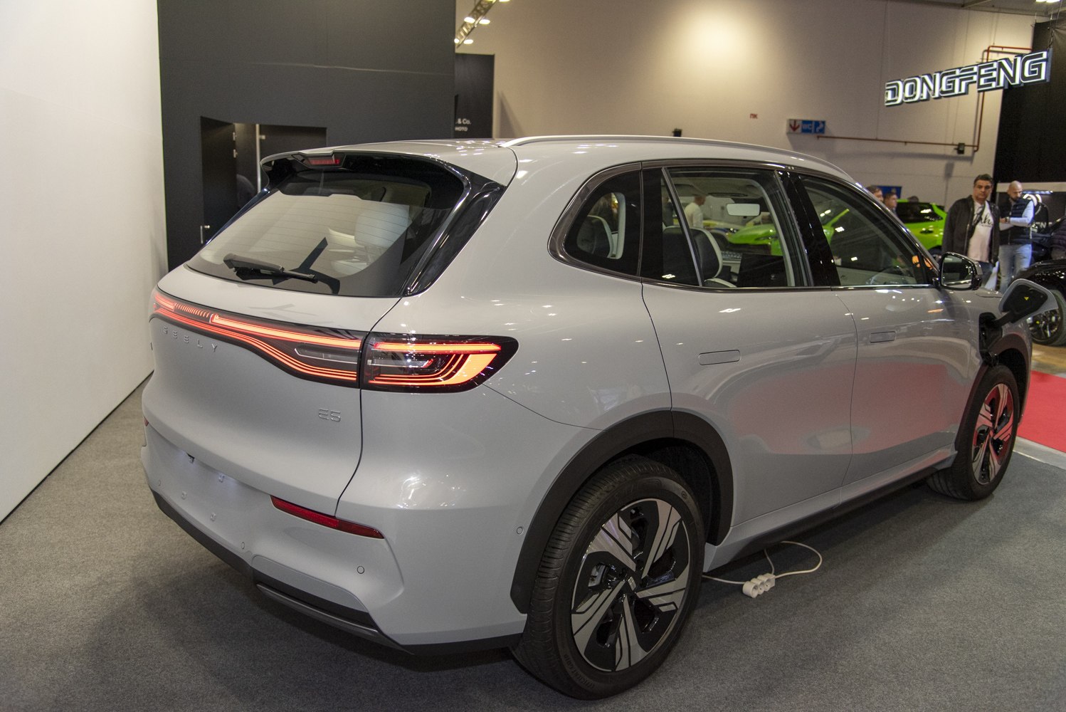 Sleek SUV rear with continuous LED tail light bar and alloy wheels.