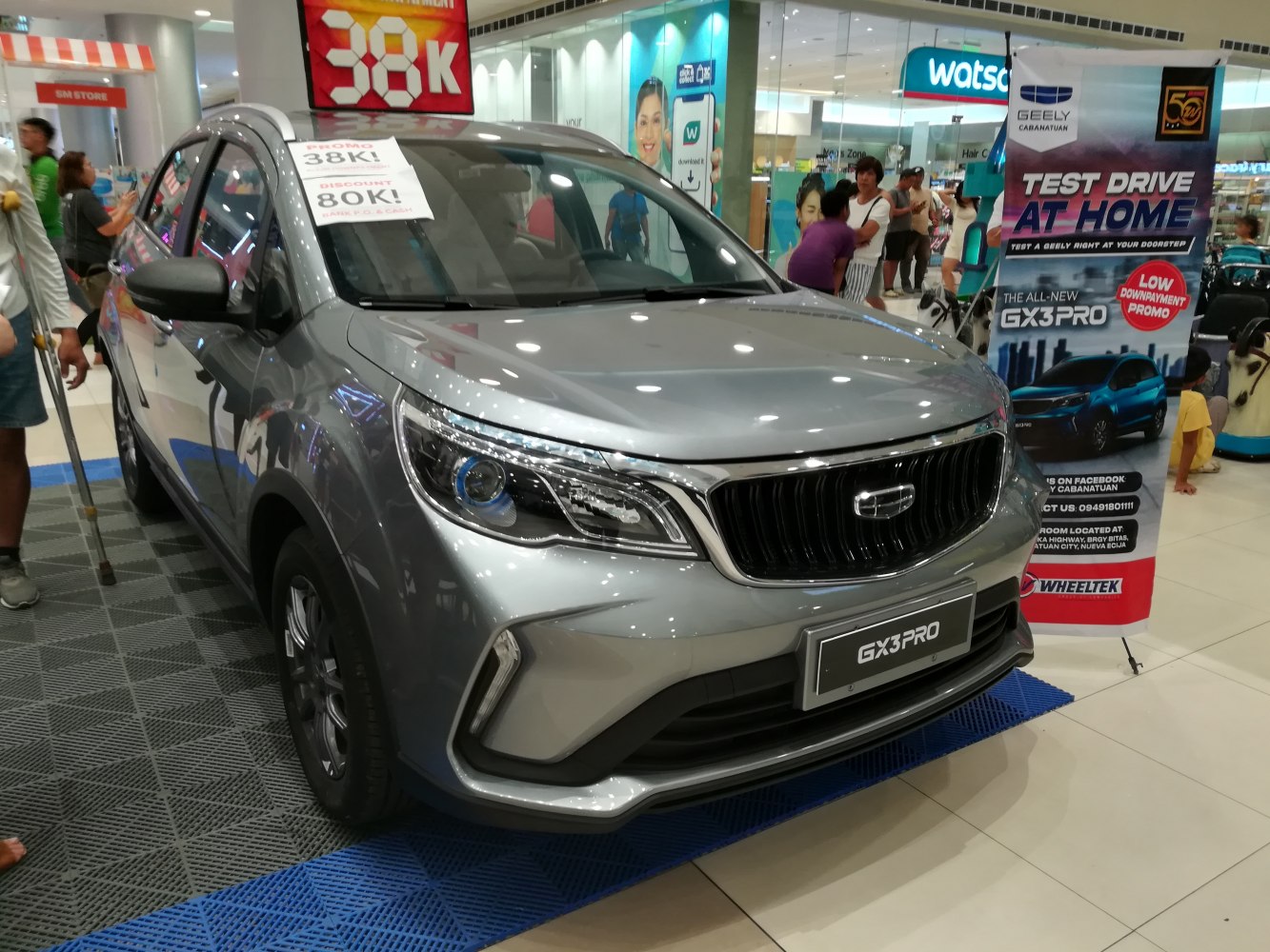 Front view with sleek headlights and bold grille
