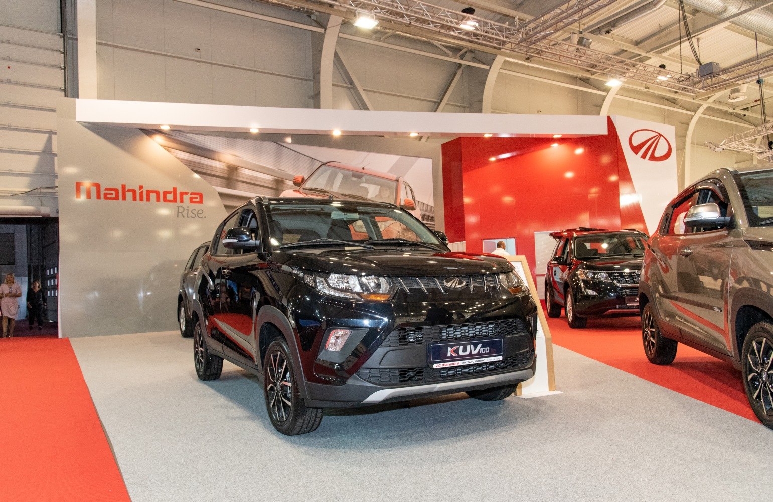 Front view of a compact black SUV with modern grille and headlights
