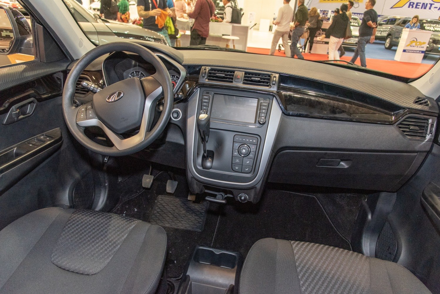 Steering wheel and dashboard with infotainment system and control panel