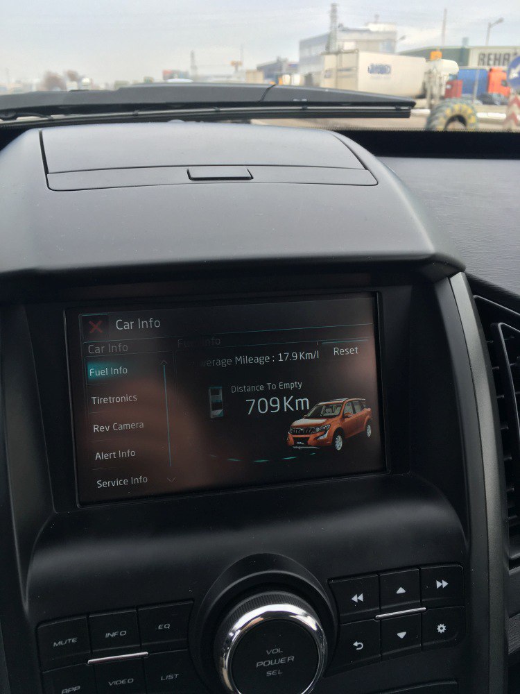 Car info display showing fuel info and distance to empty of 709 km