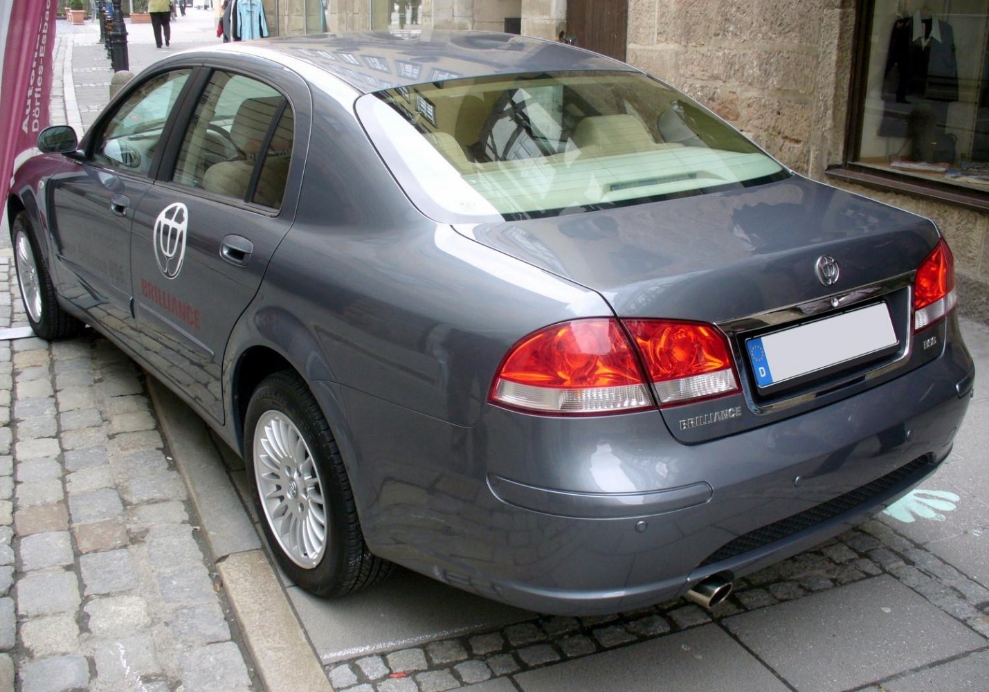 Rear and side view of a mid-size sedan with distinct taillights