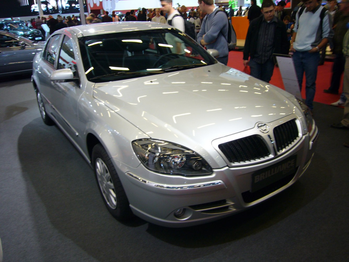 Front view with chrome grille and headlights