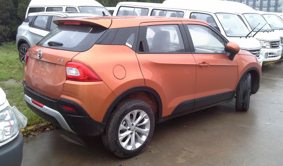 Rear 3/4 side view highlighting SUV styling with rear tail lights and alloy wheels