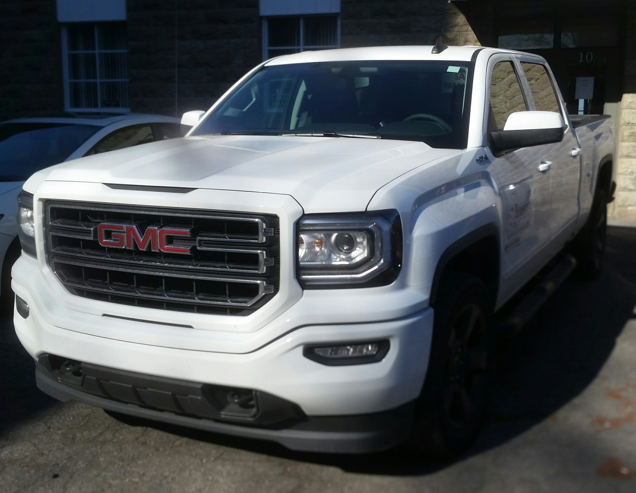Front view with GMC grille and LED headlights