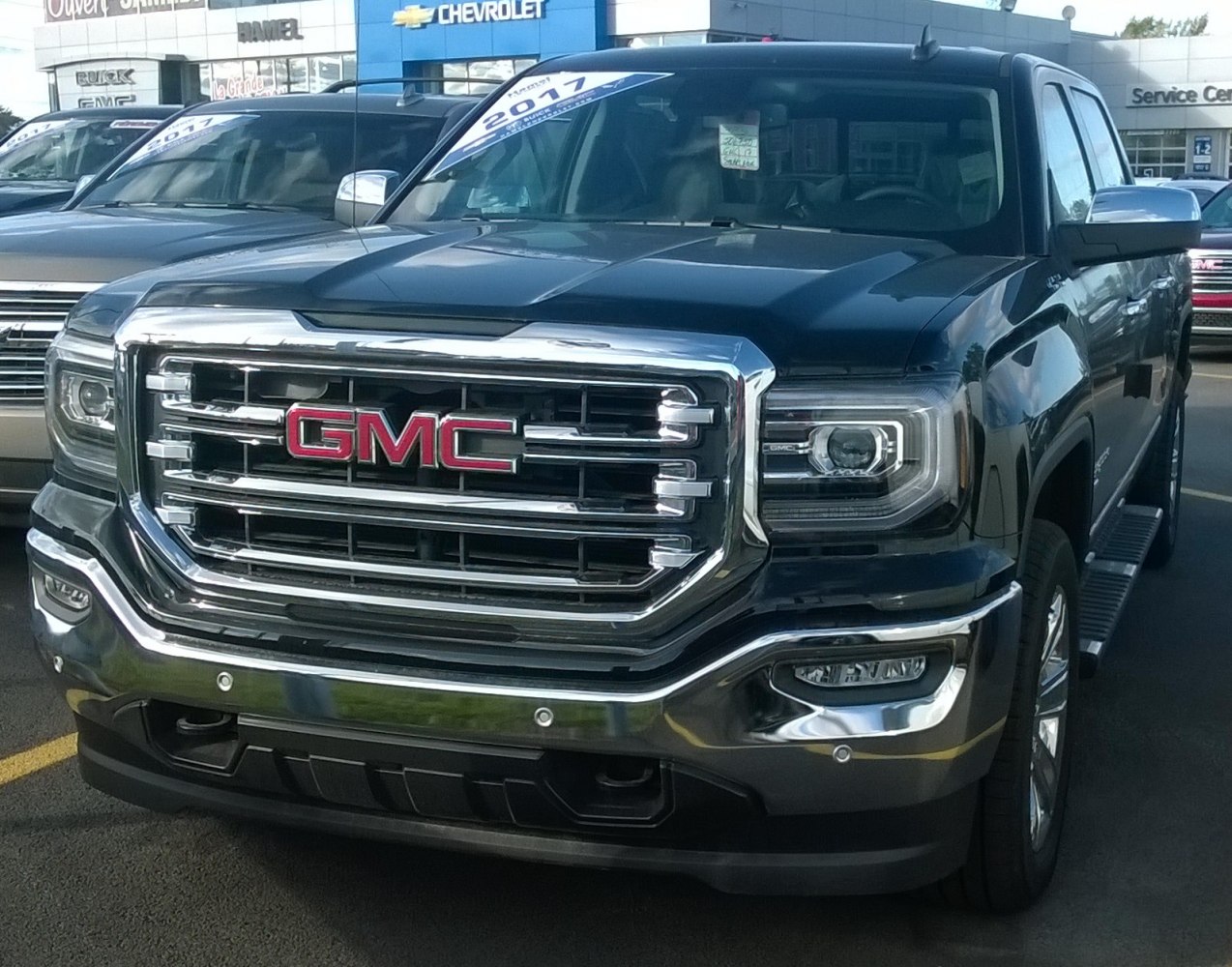 Front grille and LED headlights of a modern pickup truck