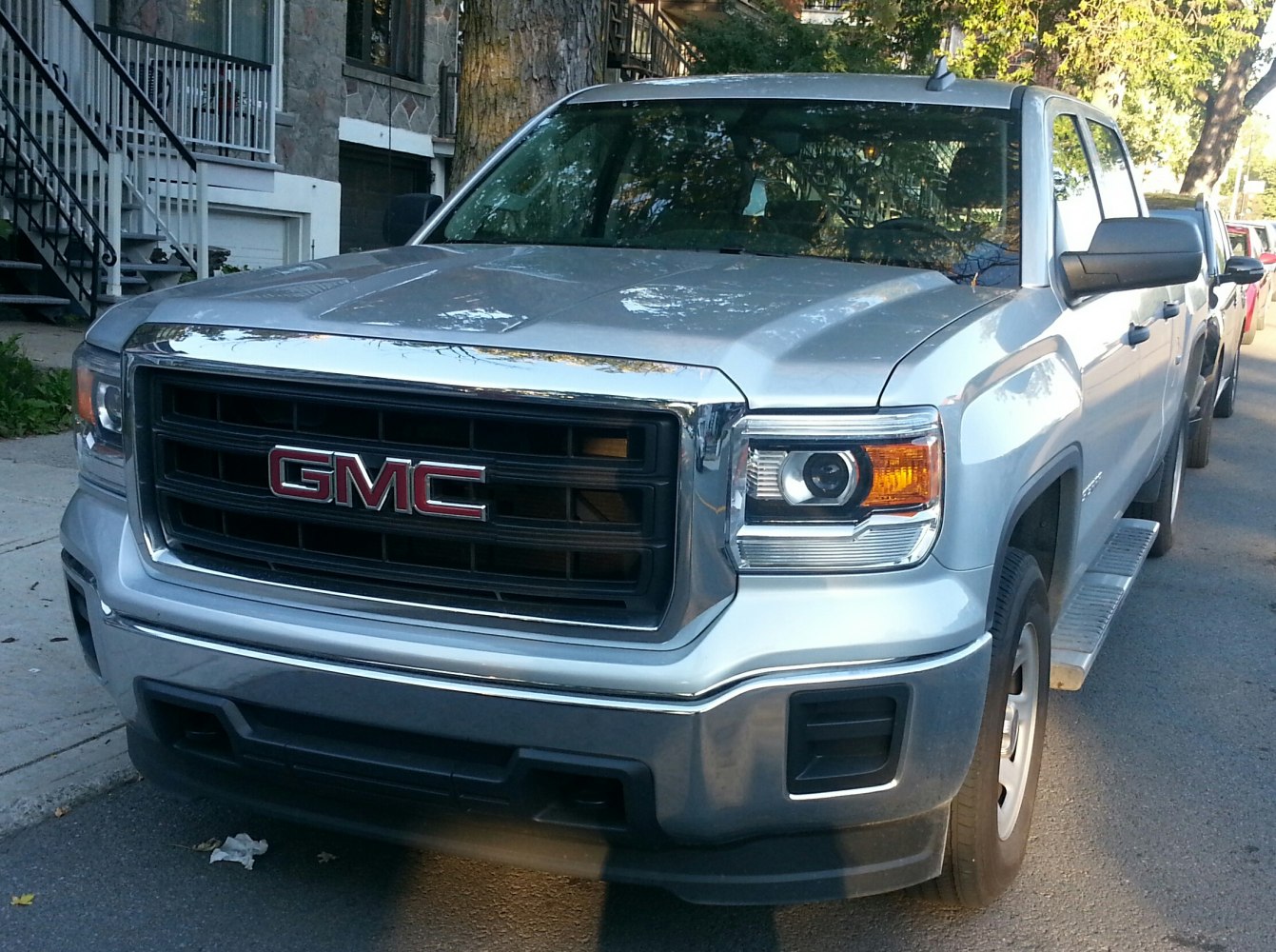 Silver pickup front grille and headlights