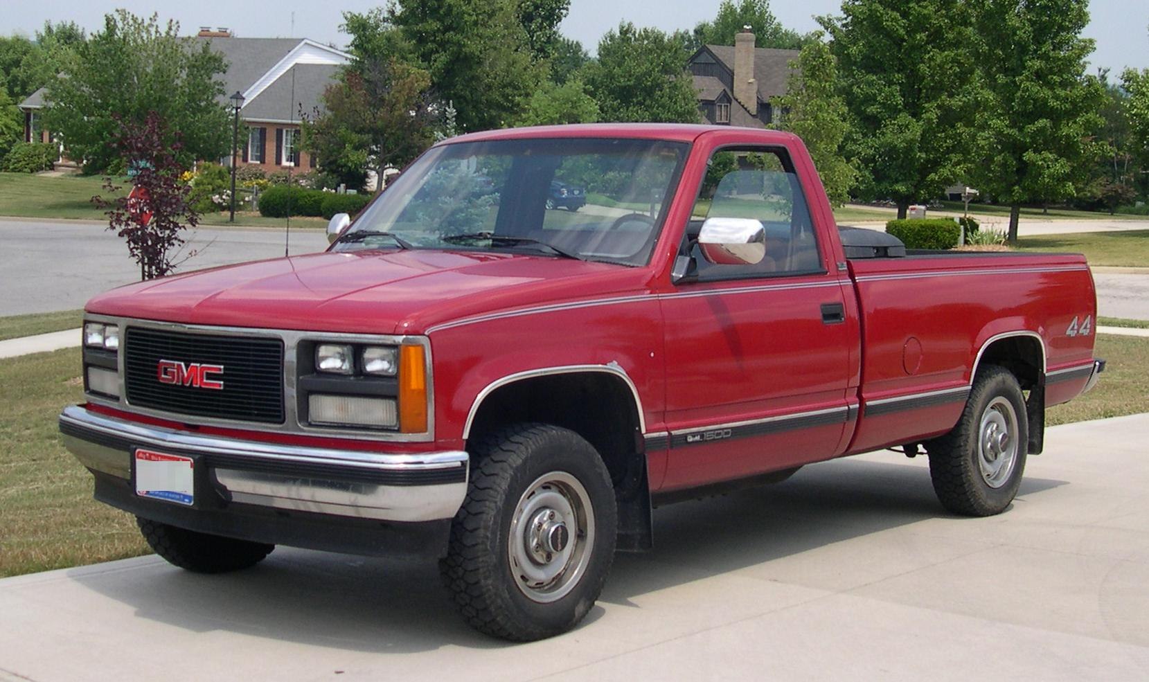 Red regular cab pickup with long bed and wideside