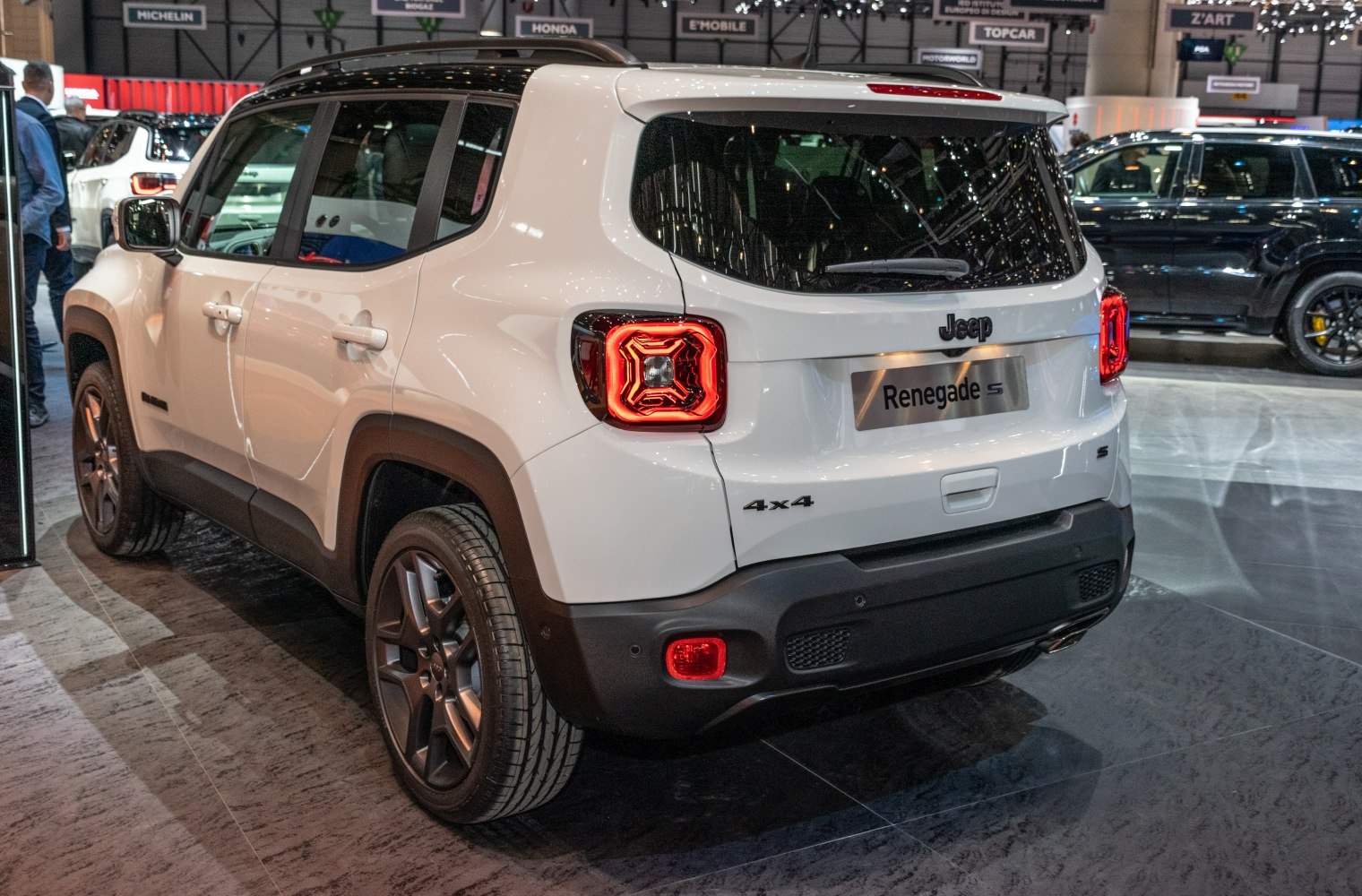 SUV rear view with distinctive LED tail lights and 4x4 badge