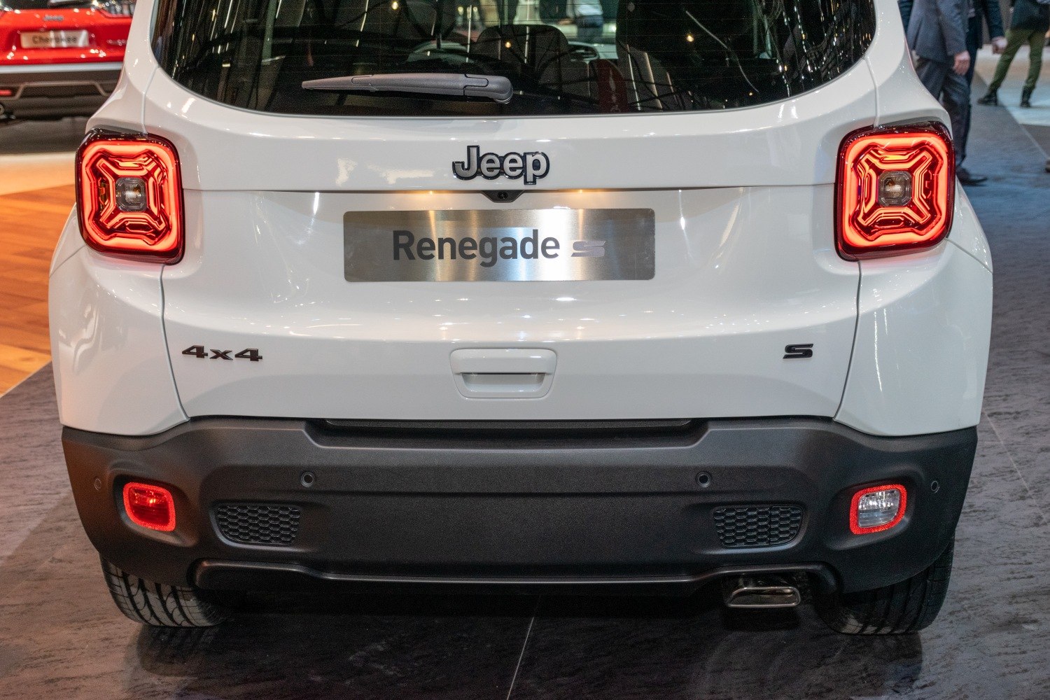 Rear view with LED taillights and 4x4 badge on white compact SUV
