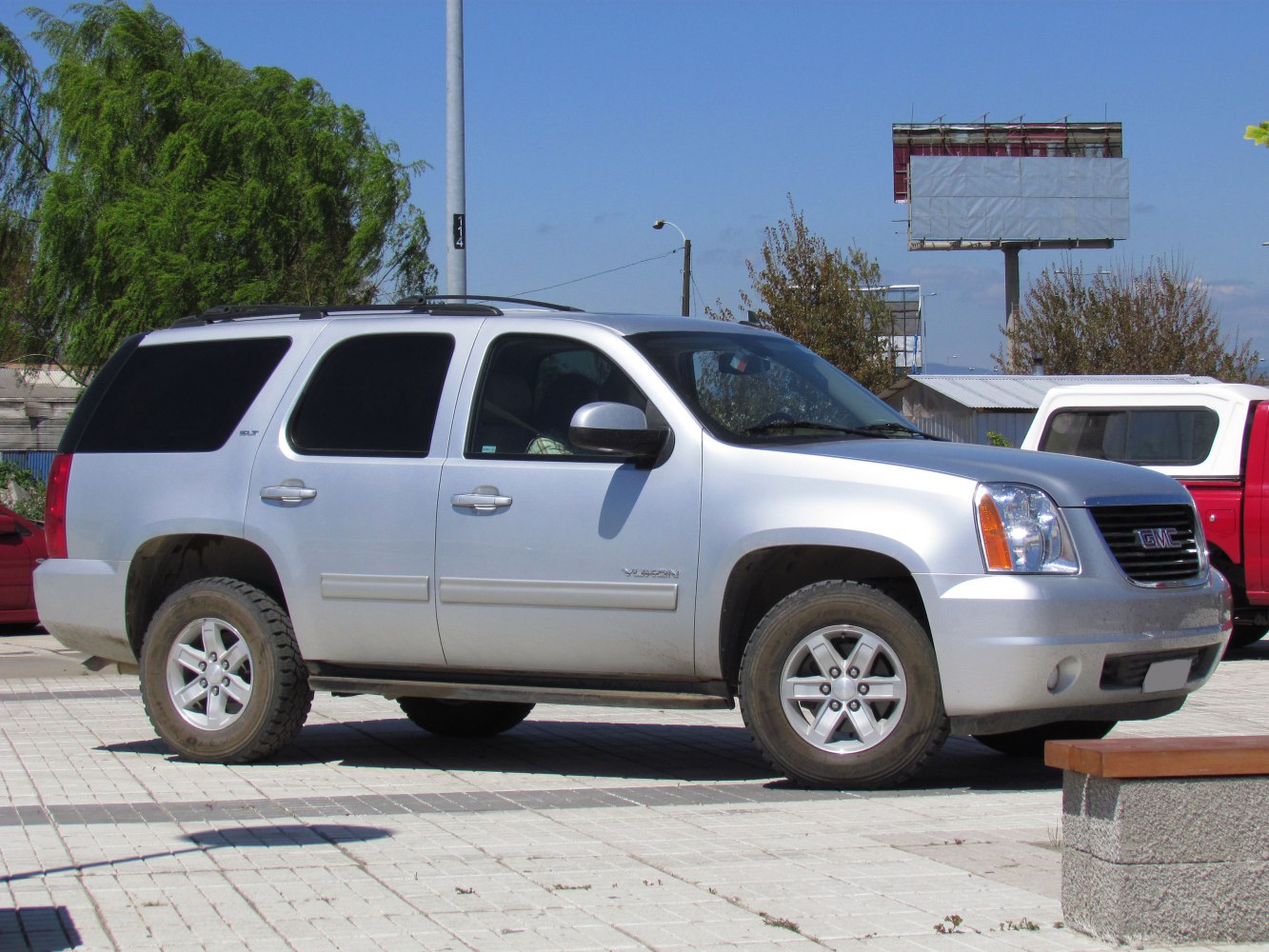 Side view of SUV with alloy wheels and tinted windows