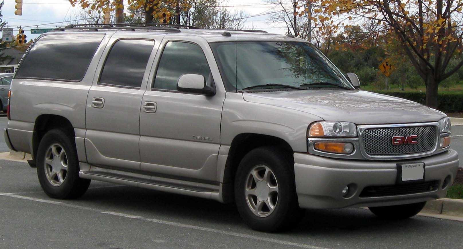 Silver SUV showing front grille, headlights, and large side windows