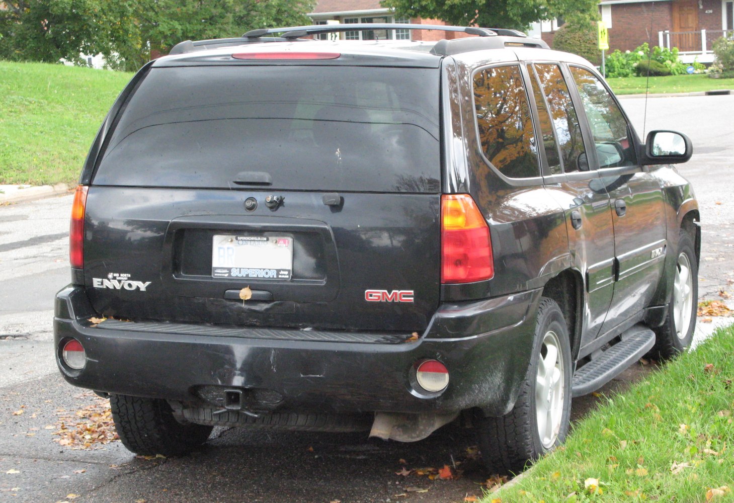 Rear view of mid-size SUV showing tailgate, taillights, and rear bumper