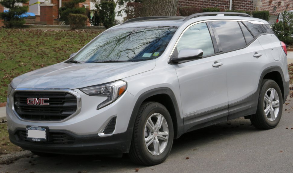 Silver SUV with modern front grille and alloy wheels