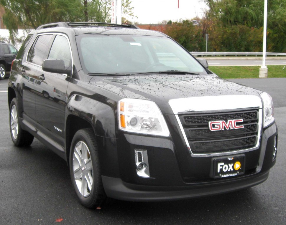 Front grille and headlight design of an SUV.