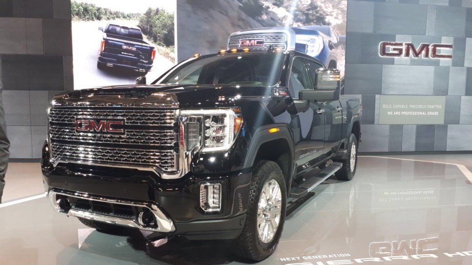 Bold front grille and LED headlights of a heavy-duty double cab truck