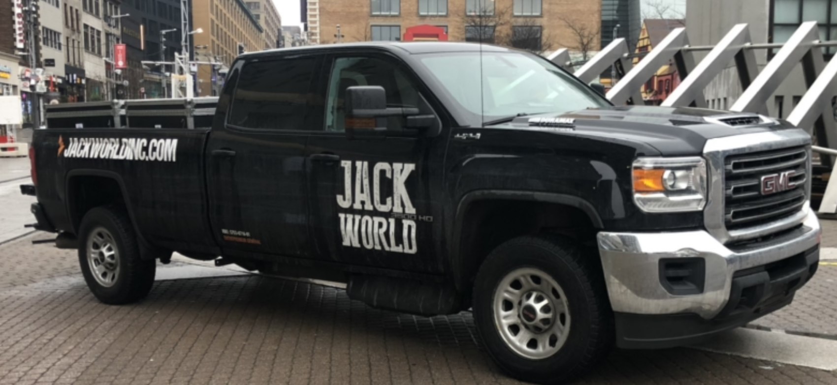 Heavy duty pickup with four-door crew cab and extended long cargo bed