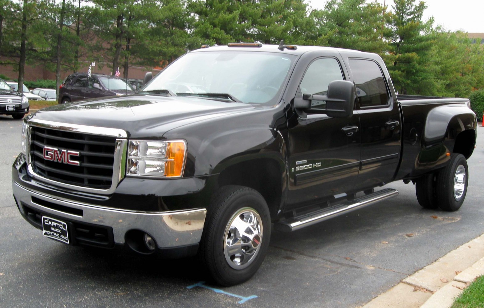 Heavy duty pickup truck with dual rear wheels and chrome grille