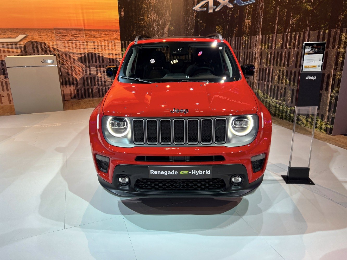 Front view with round LED headlights and e-Hybrid badge
