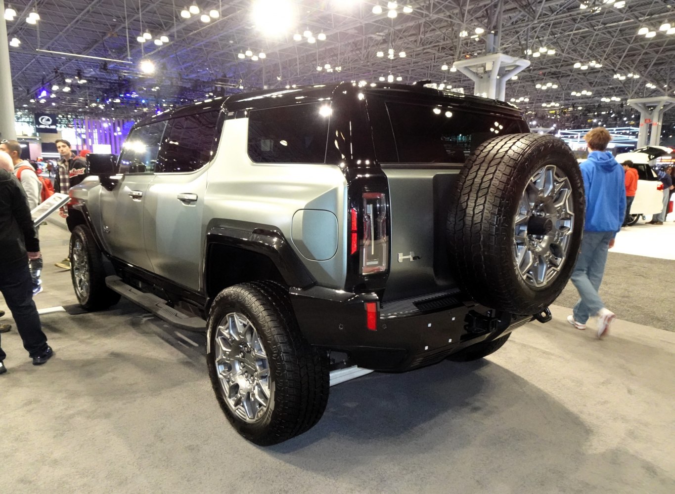 Rear and side view of rugged SUV with rear spare tire mount and tinted windows