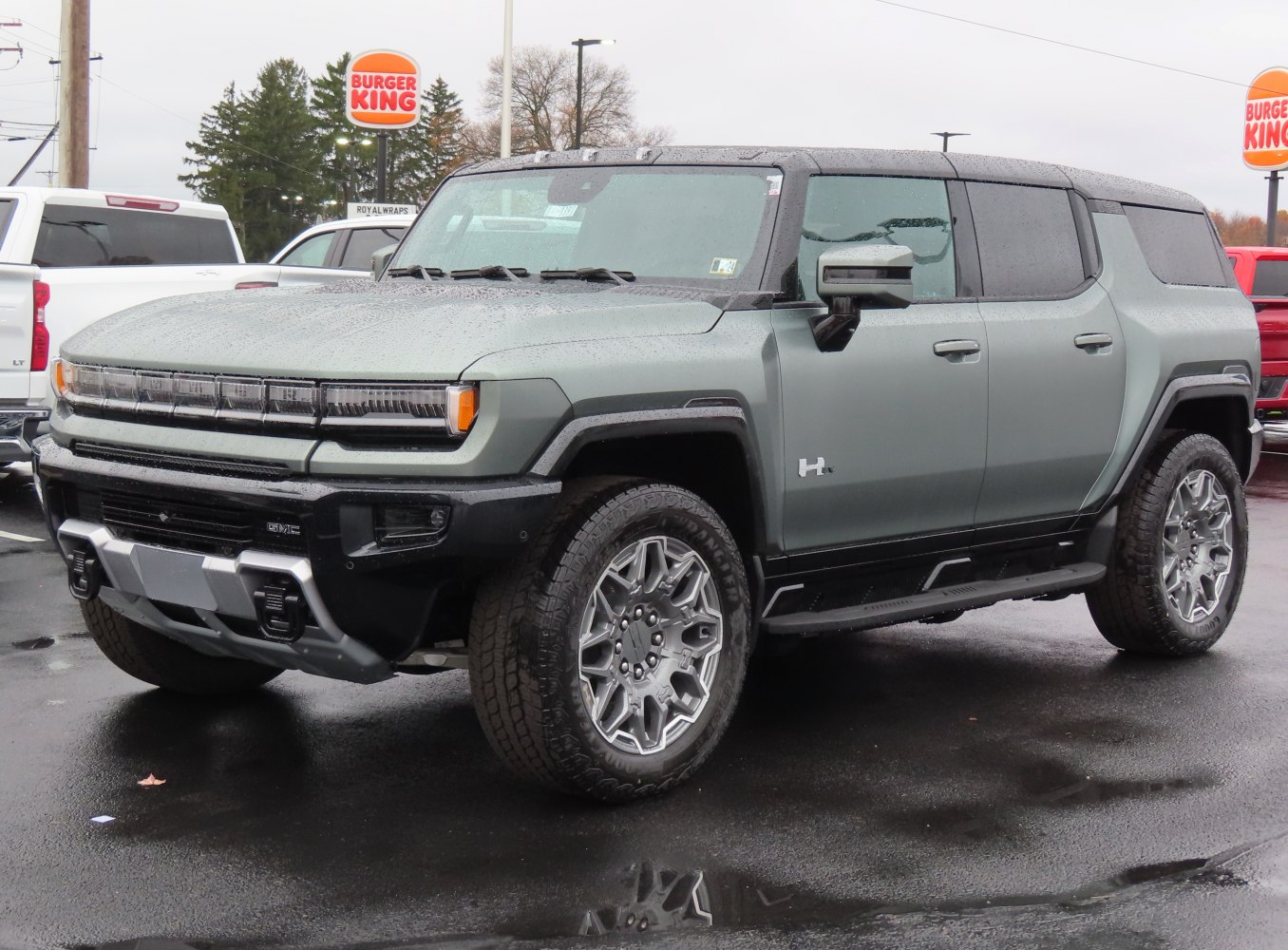 Rugged electric SUV with LED headlights and all-terrain tires