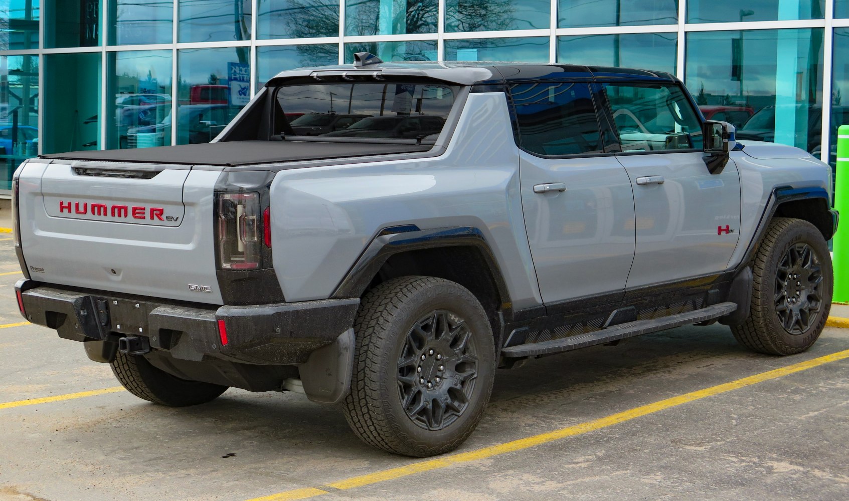 Rear and side view of electric pickup with rugged design