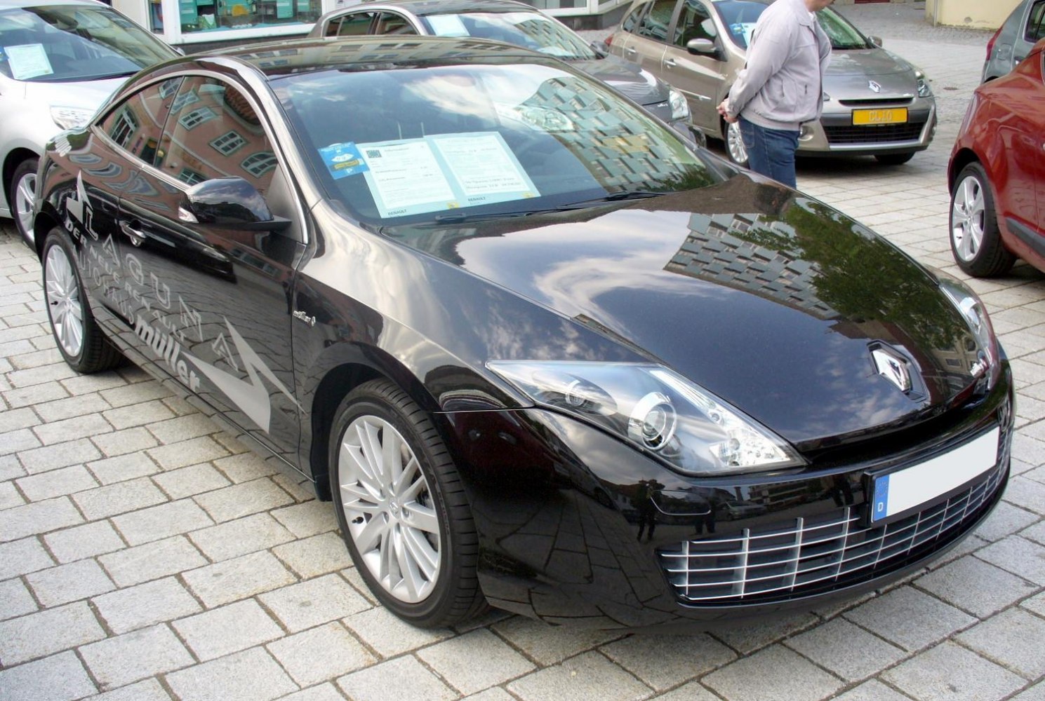Sleek front design with distinctive headlights and horizontal grille bars