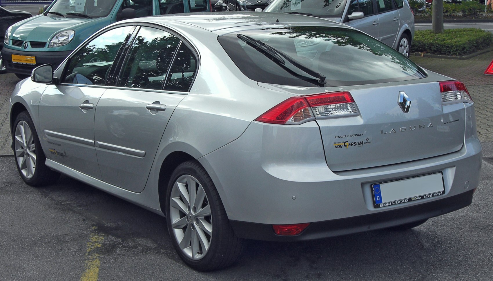 Rear view with distinctive taillights and rear windshield wiper