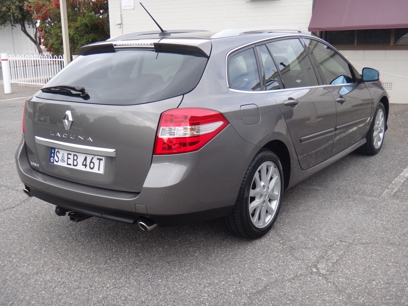 Rear and side view of a station wagon with distinctive tail lights and hatchback.