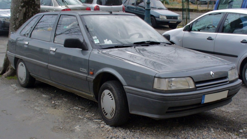 Front and side exterior view of a 1986 hatchback with classic 80s design.