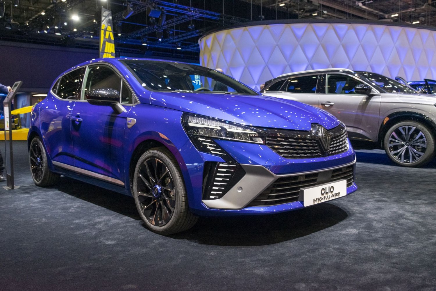 Sleek front view with LED headlights and black alloy wheels