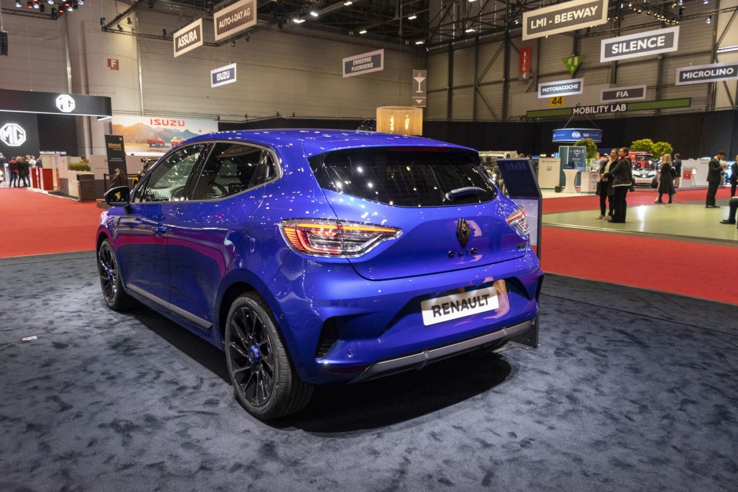Blue hatchback rear view with modern taillights and black alloy wheels