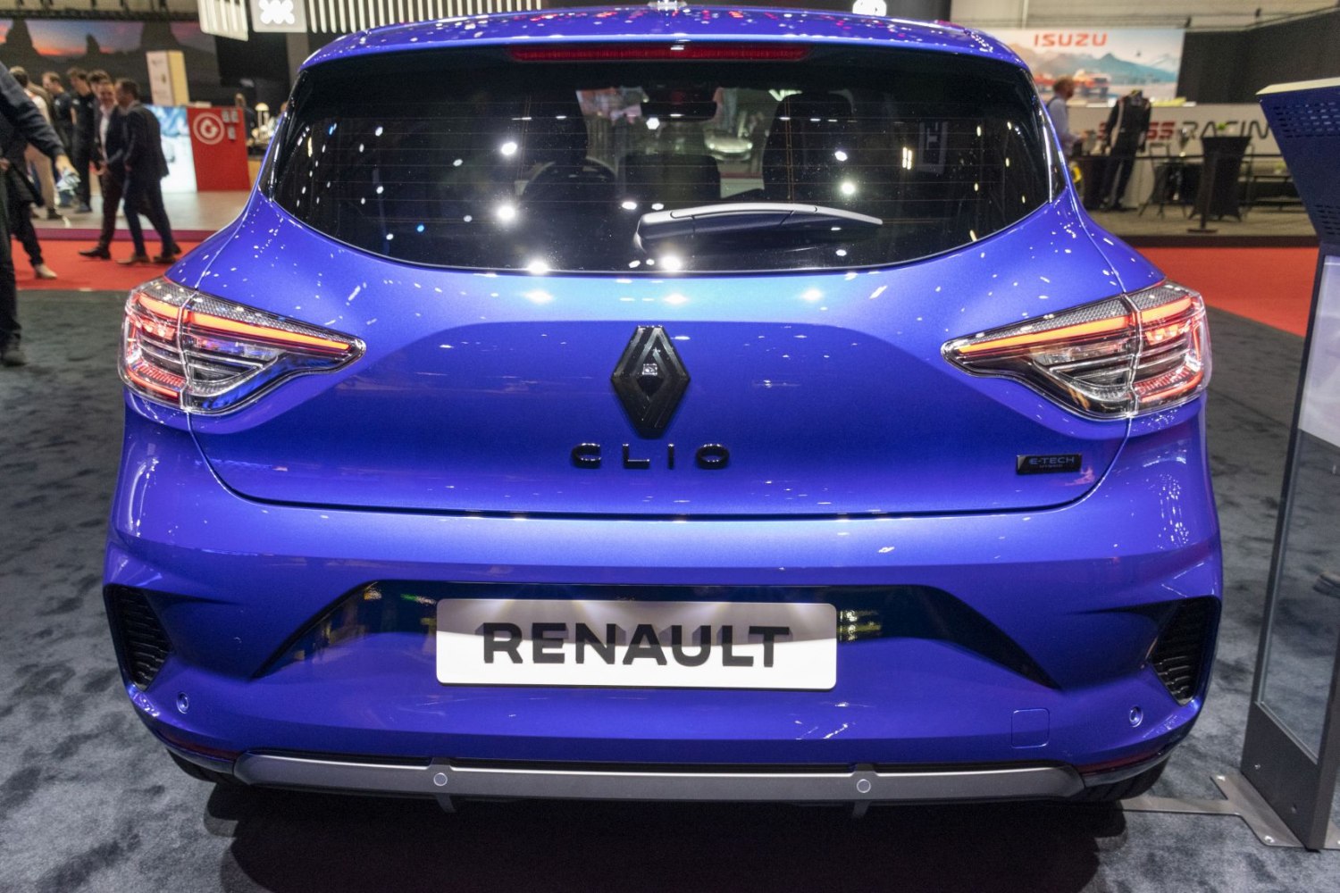 Rear view and taillight design of a compact hatchback with E-TECH badge and parking sensors