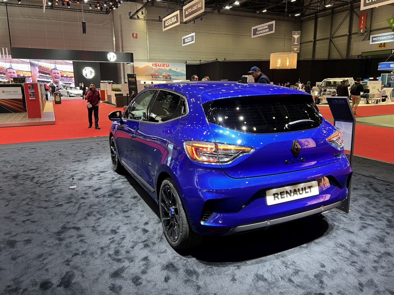 Rear view of blue hatchback with distinct modern taillights