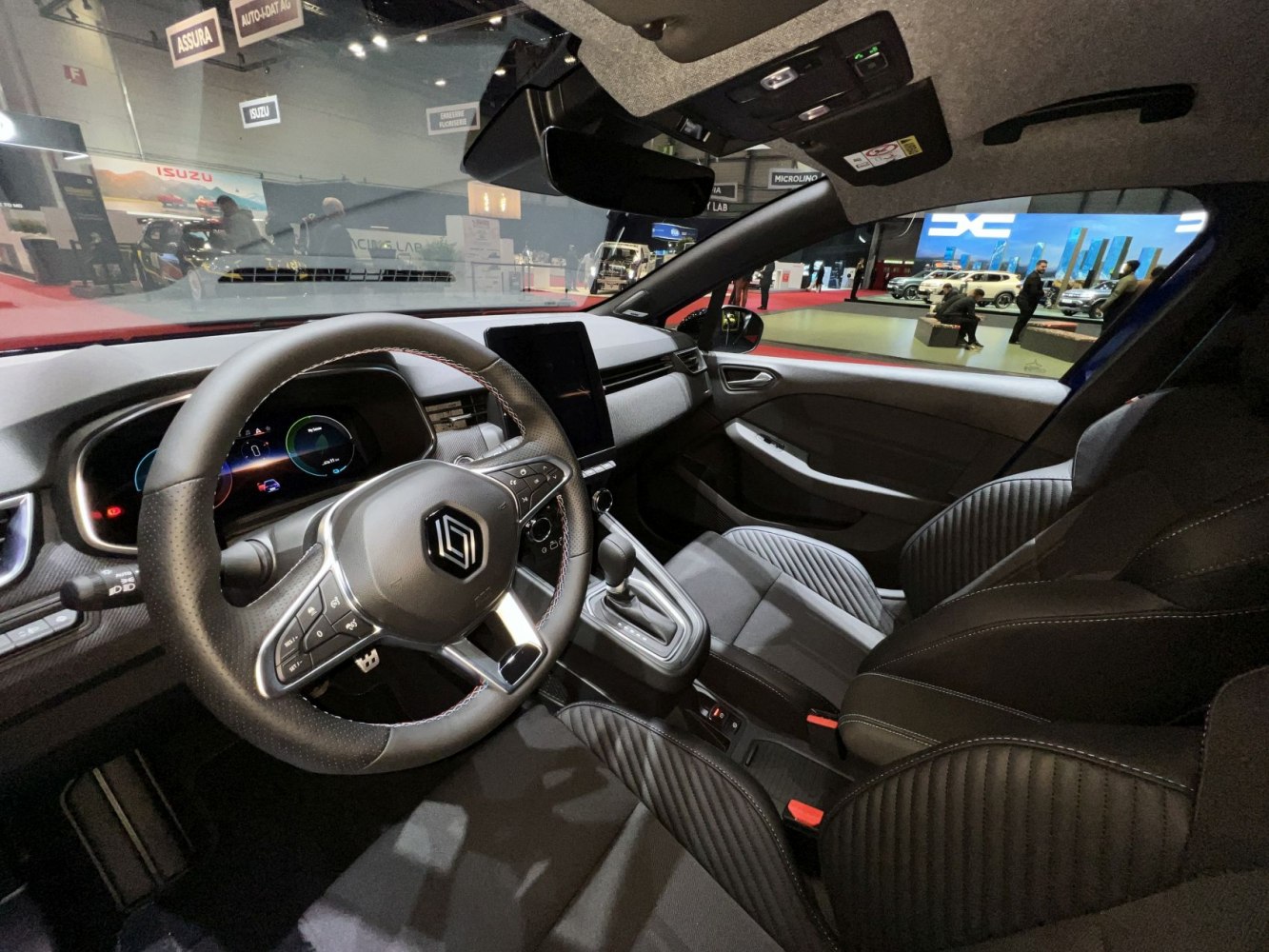 Digital dashboard and leather-wrapped steering wheel with control buttons