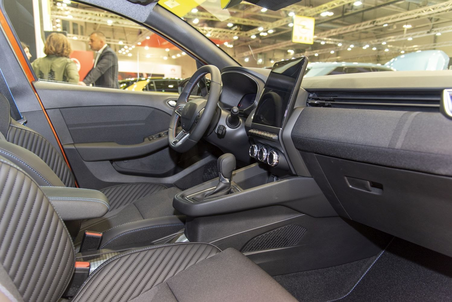 Modern car interior with digital dashboard and ergonomic seats
