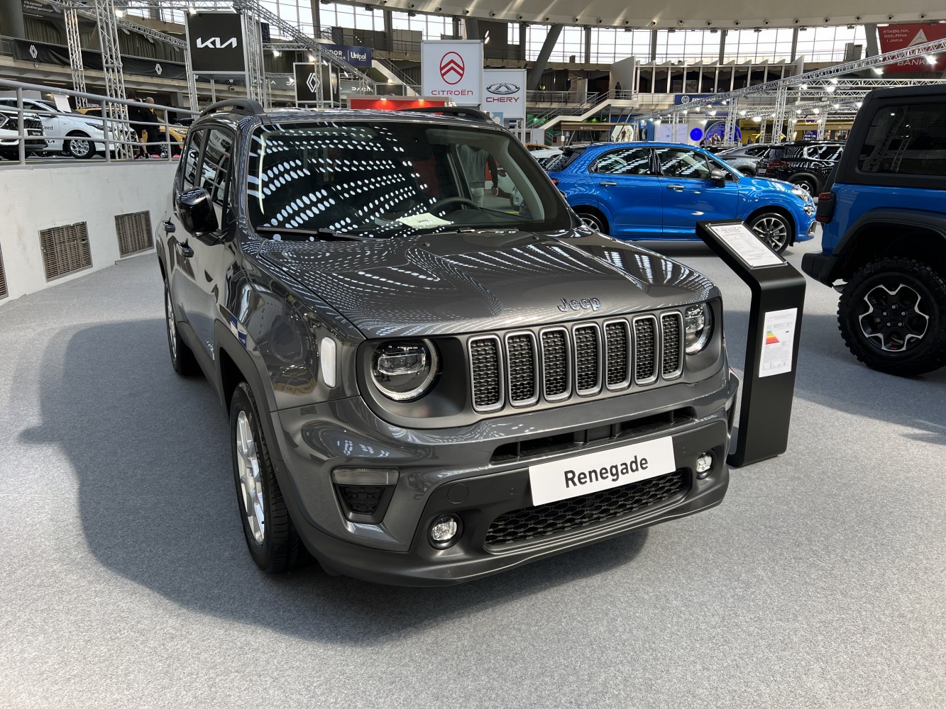Front view of SUV with seven-slot grille and round LED headlights