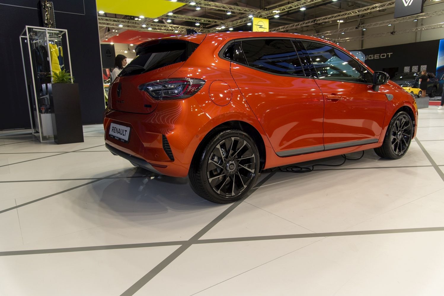 Side and rear view with sleek taillights and alloy wheels