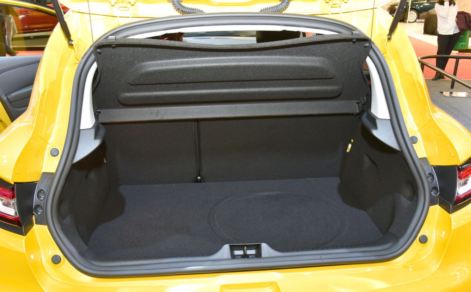 Spacious black fabric cargo trunk interior with open hatchback