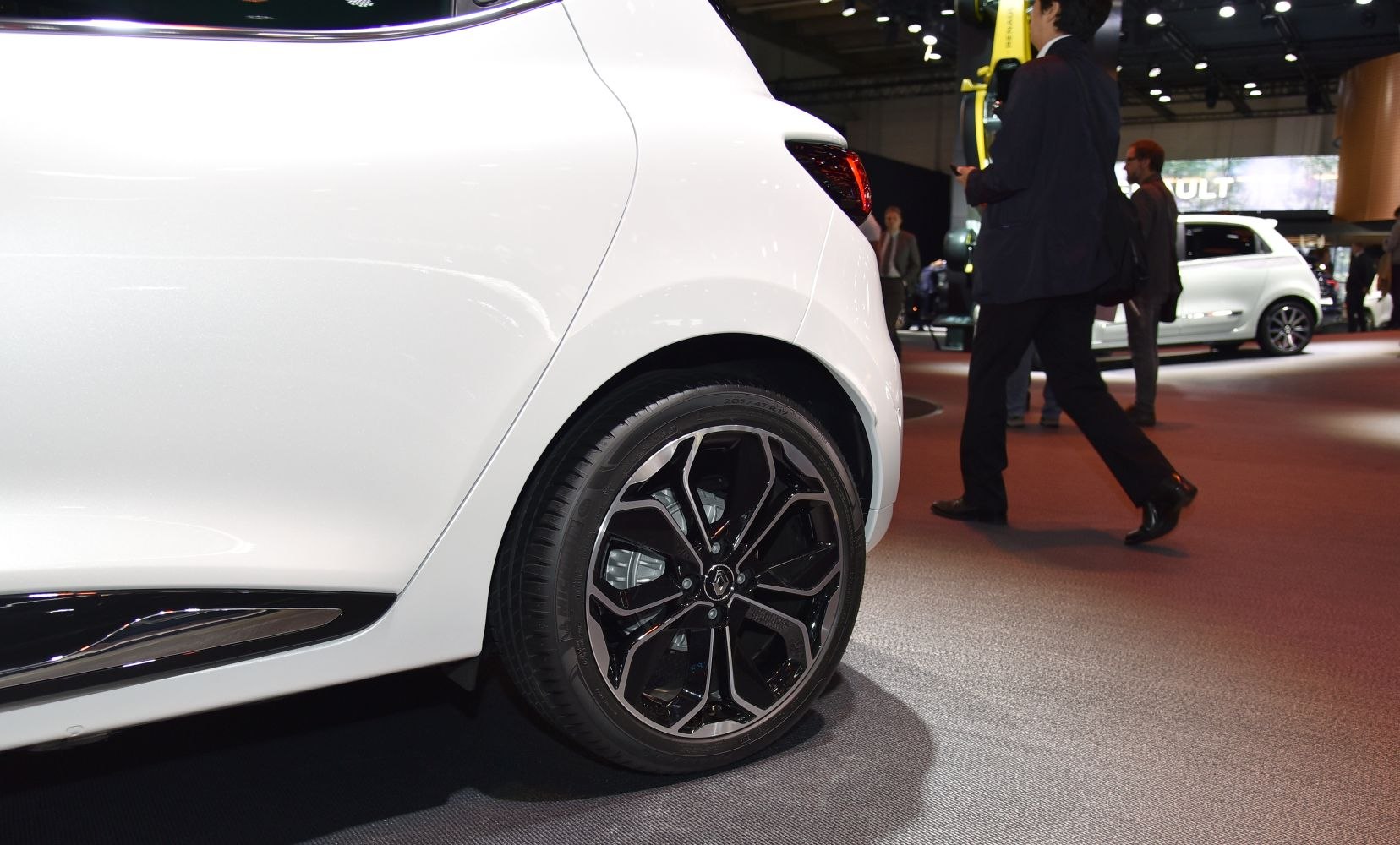 Rear wheel and fender with black and silver alloy rim