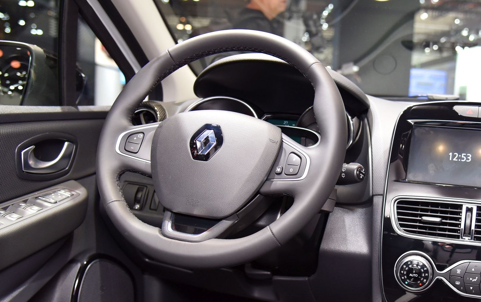 Steering wheel with controls and digital dashboard display