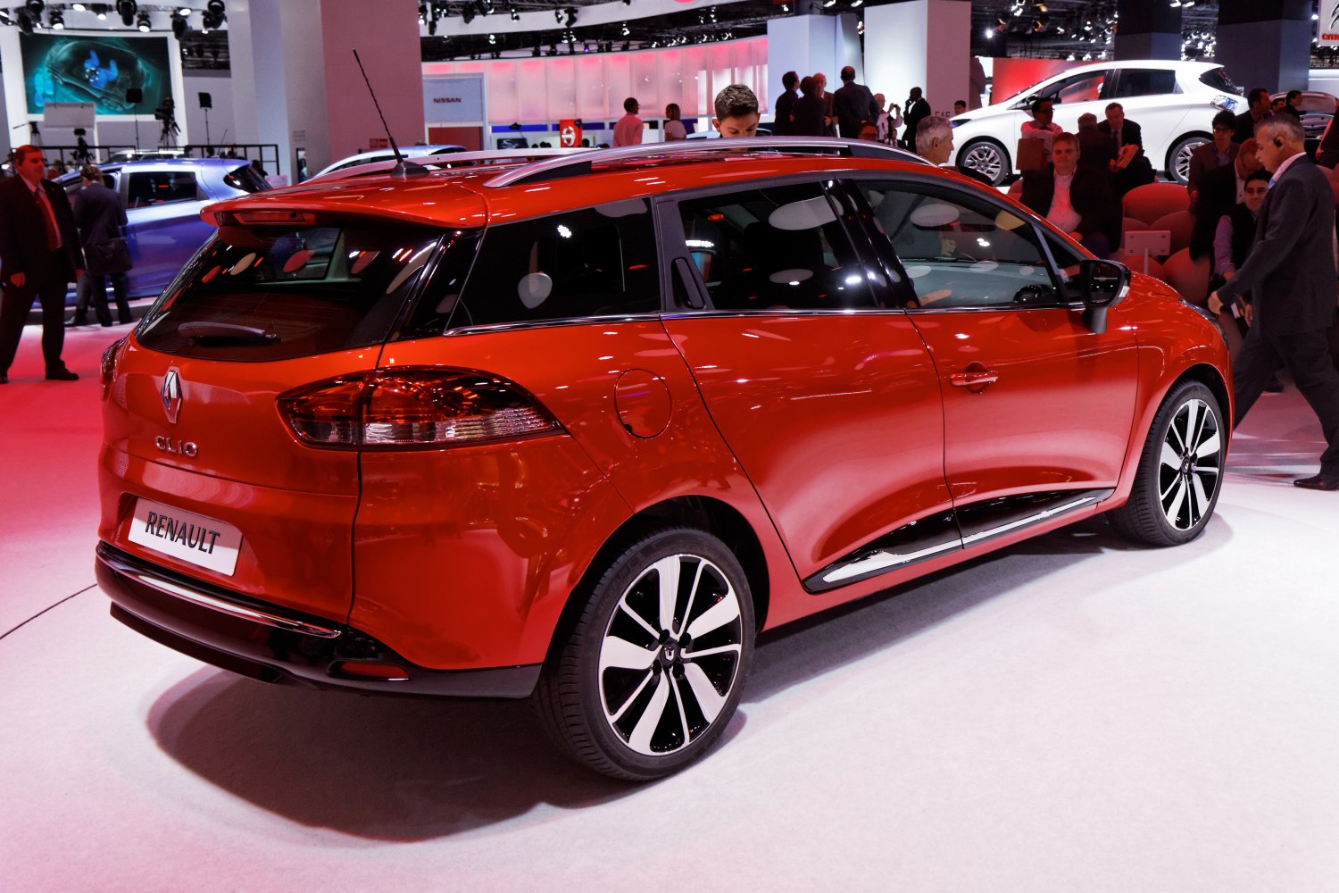 Rear side profile with taillights and alloy wheels
