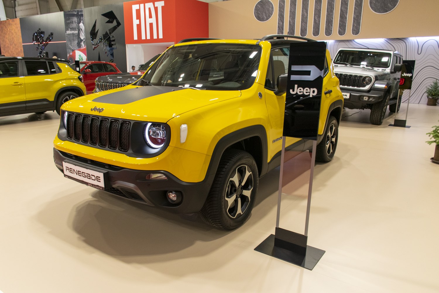 Front view with round LED headlights and seven-slot grille