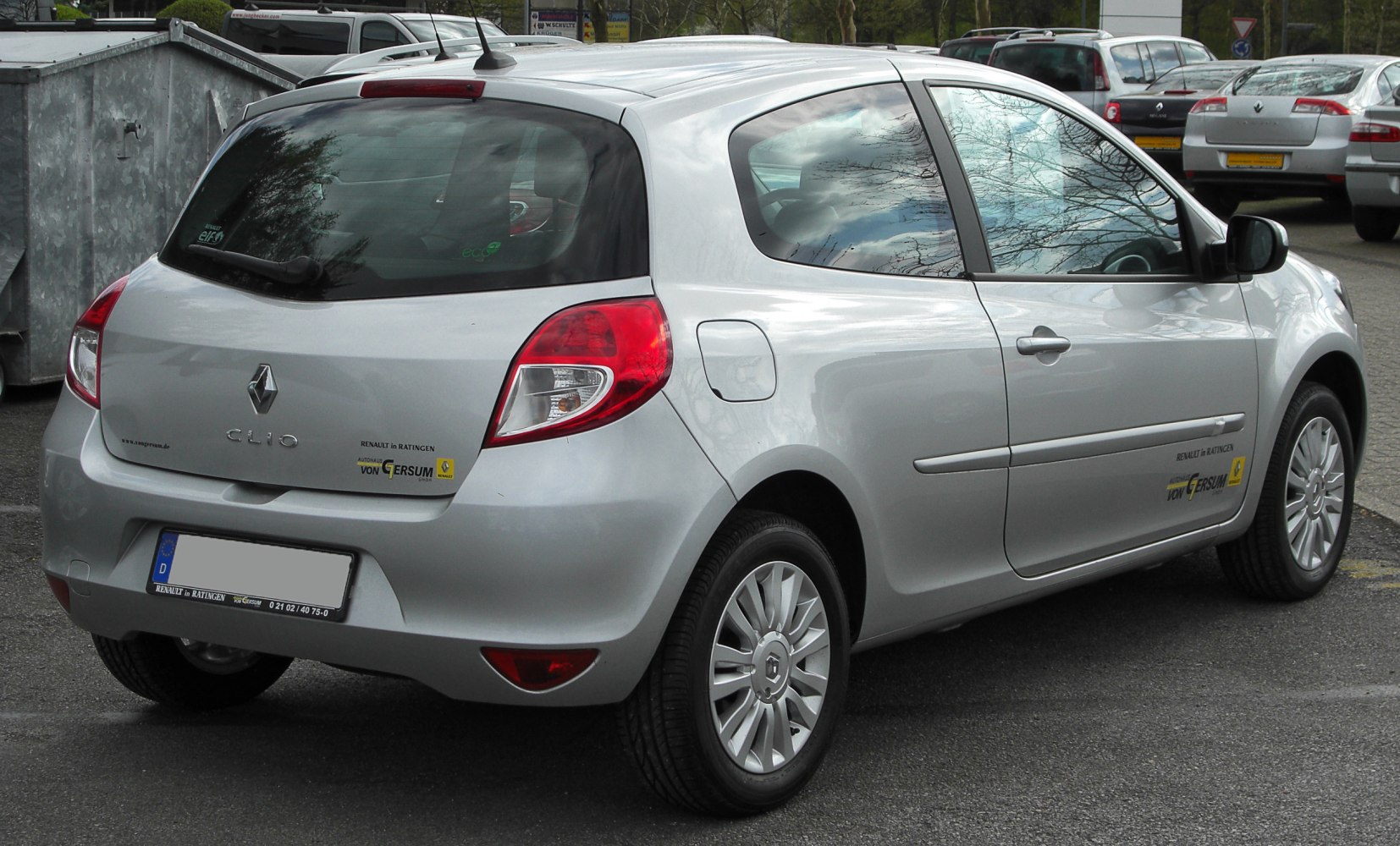Rear side view with distinctive taillights and alloy wheels