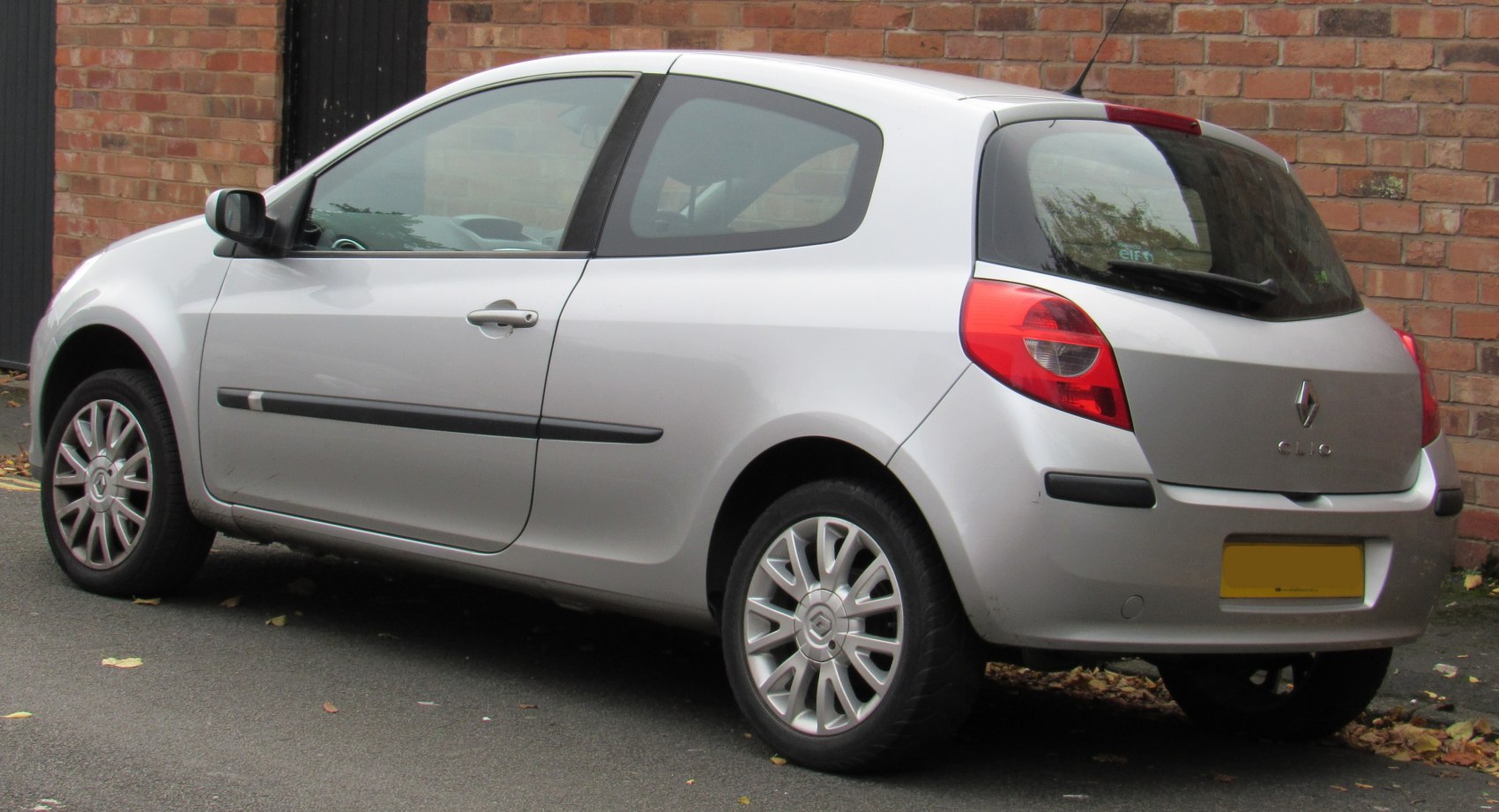 Silver 3-door hatchback rear side view with alloy wheels